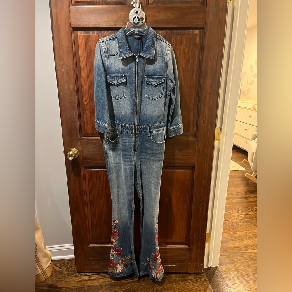 Denim jumpsuit with floral detail